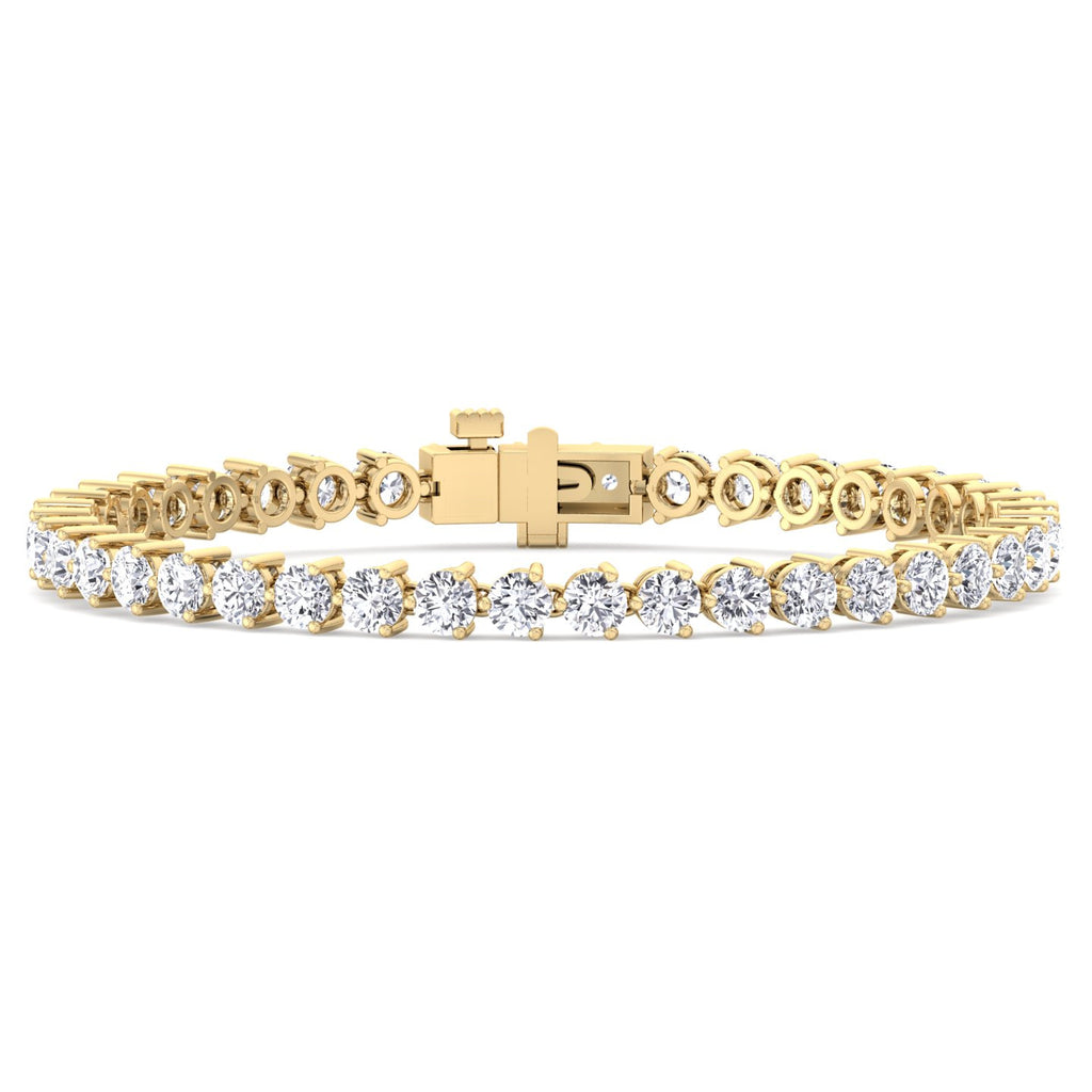 Three prong round natural diamond tennis bracelet in solid yellow gold