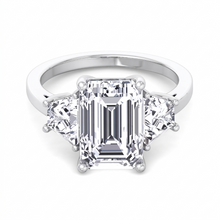 Vela three-stone natural diamond engagement ring with emerald cut center and trapezoid side stones in white gold