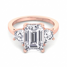 Vela natural diamond engagement ring detail showing the angled trapezoid side stones